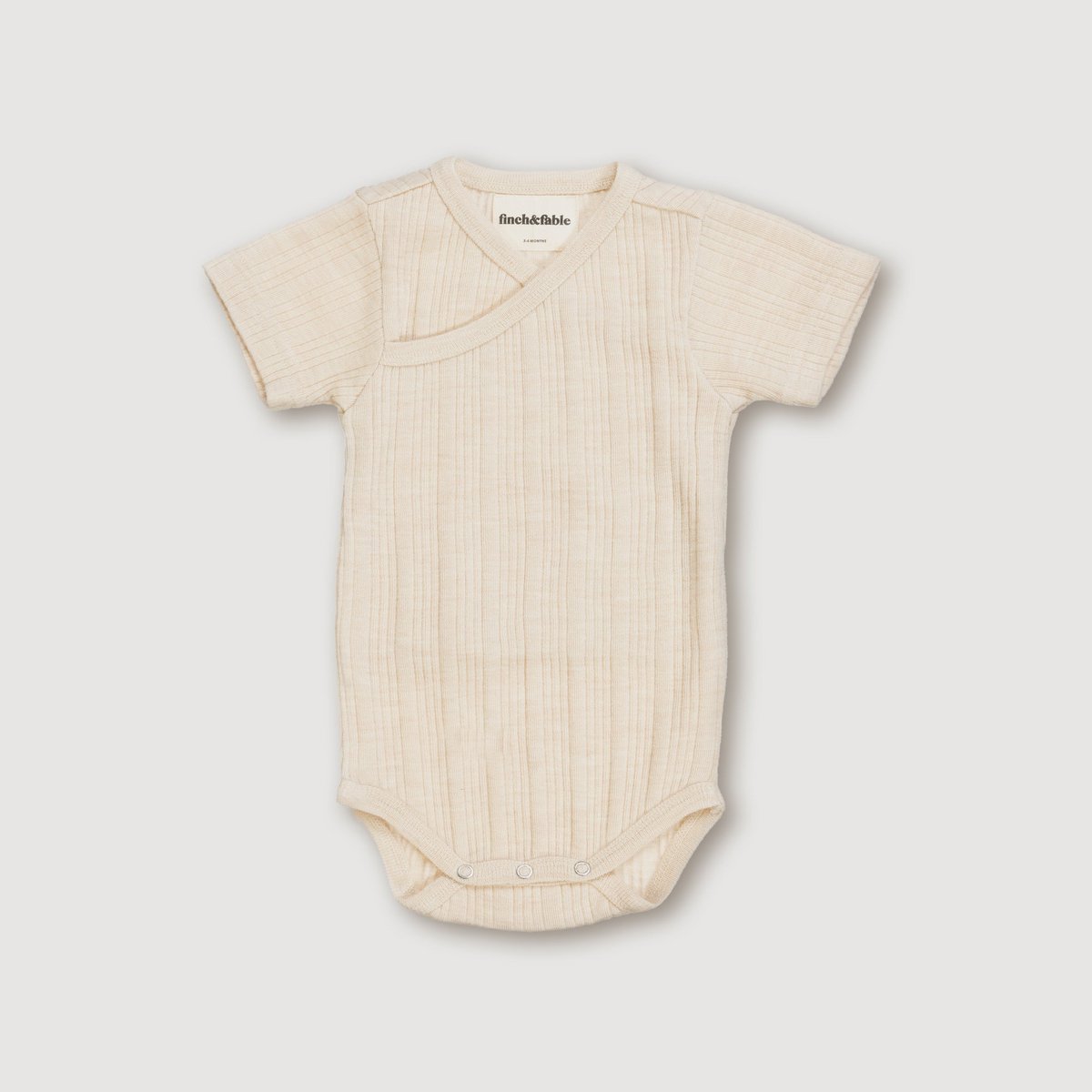 S/S bodysuit van wollen ribstof - Haver