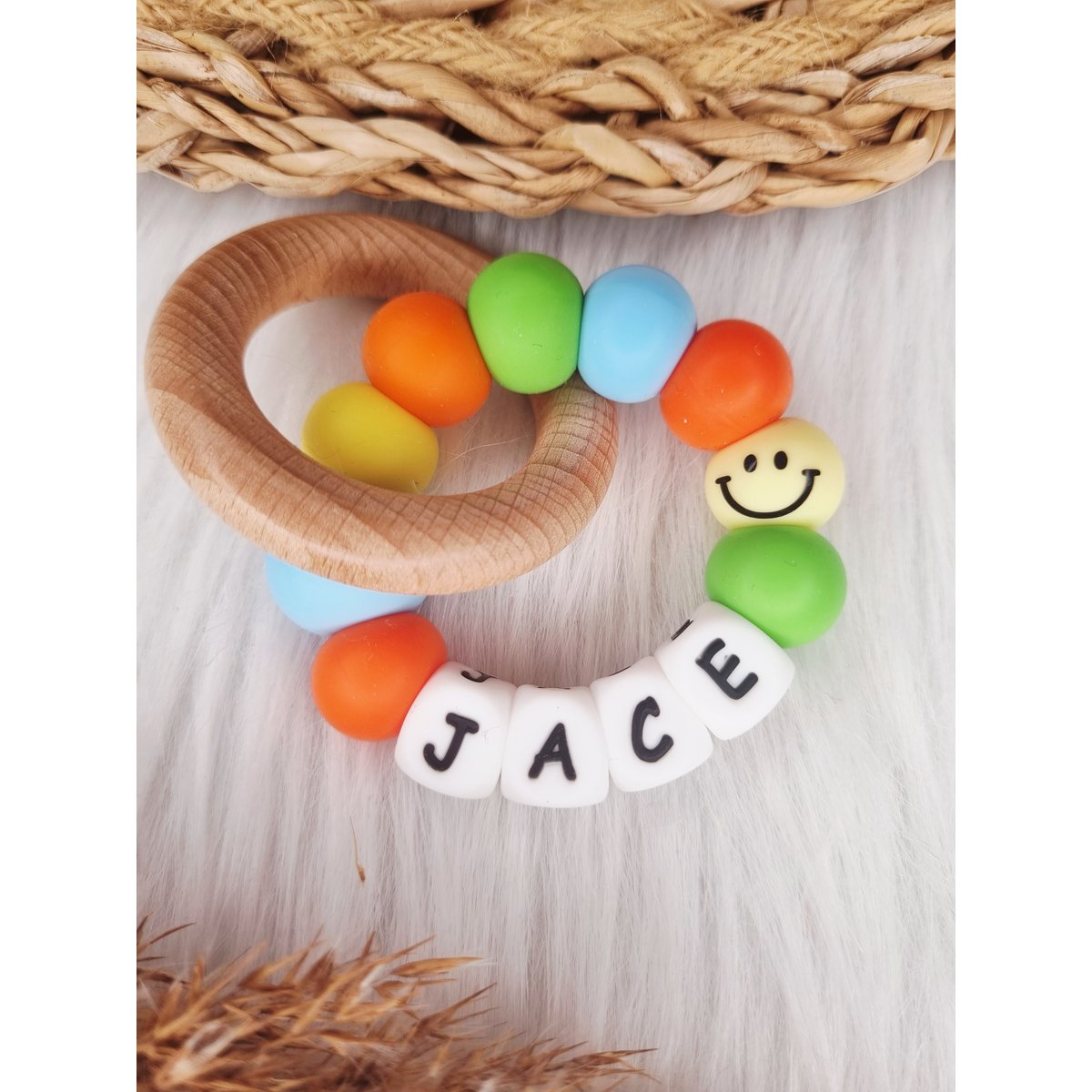 Bijtring met naam Smiley – Babyblauw