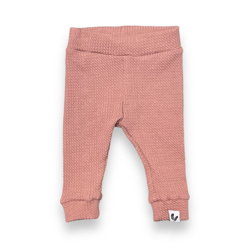 Blouse met ruffles en kabelsteek in clay pink