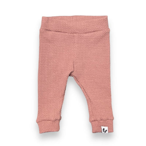 Blouse met ruffles en kabelsteek in clay pink