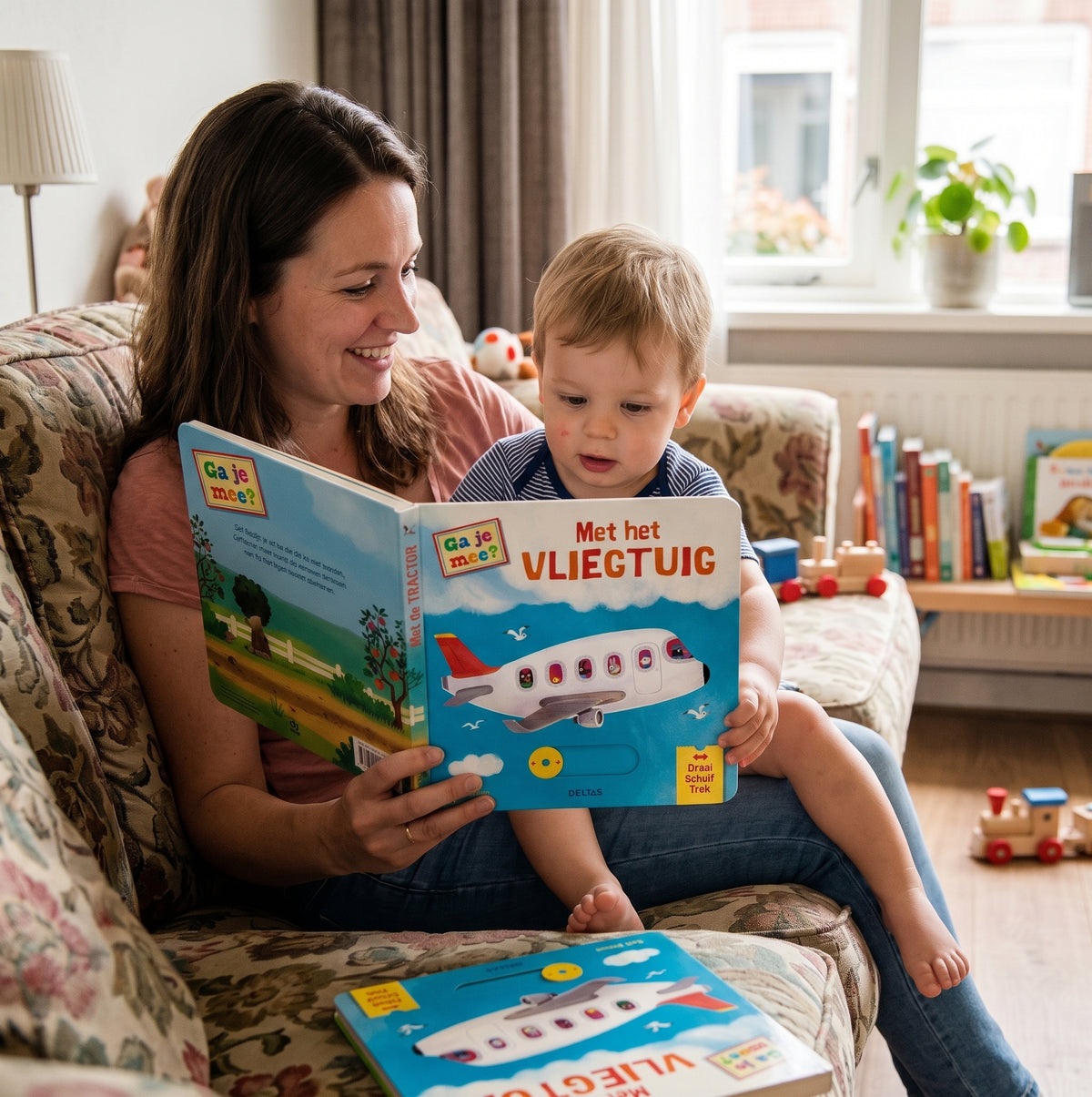 Interactief babyboekje Ga je mee met het vliegtuig met beweegbare elementen
